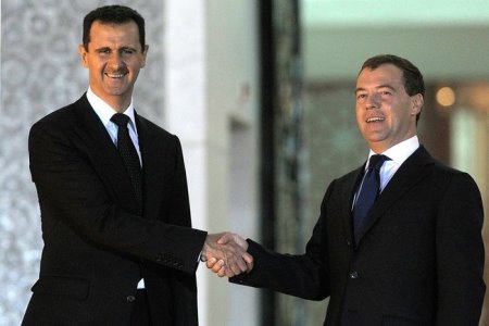 Russian PM Dmitry Medvedev meets with Syrian President Bashar al-Asad in Syria, May 2010.